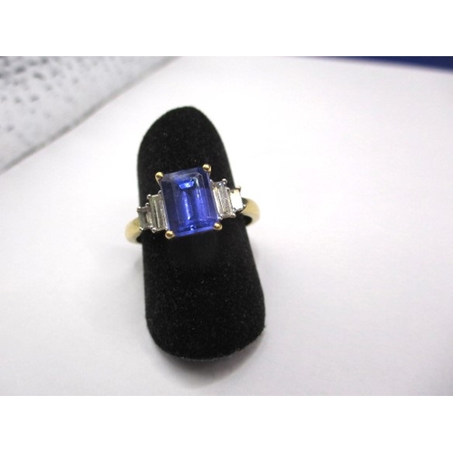 13 - An 18ct yellow gold diamond and tanzanite dress ring, approx. ring size ‘P’, approx. weight 3.9g in ... 