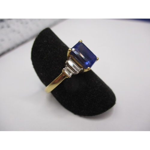 13 - An 18ct yellow gold diamond and tanzanite dress ring, approx. ring size ‘P’, approx. weight 3.9g in ... 