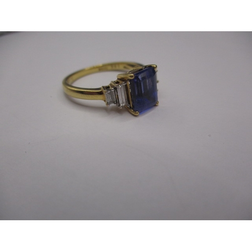 13 - An 18ct yellow gold diamond and tanzanite dress ring, approx. ring size ‘P’, approx. weight 3.9g in ... 