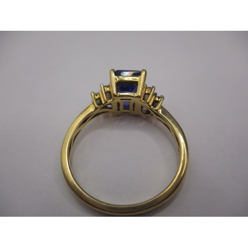 13 - An 18ct yellow gold diamond and tanzanite dress ring, approx. ring size ‘P’, approx. weight 3.9g in ... 