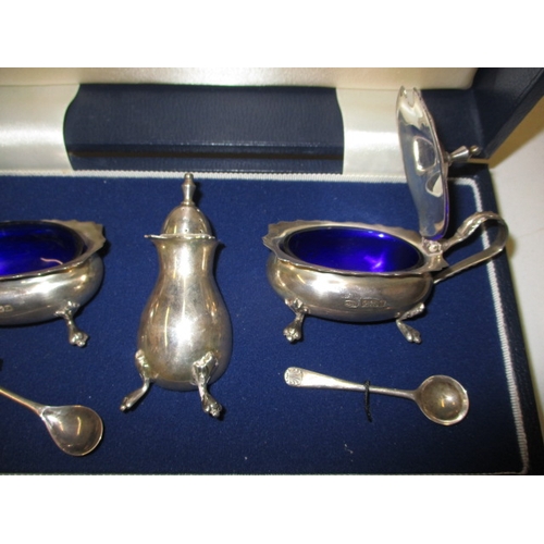 144 - A boxed sterling silver cruet set, with original matching spoons, approx. gross weight without liner... 