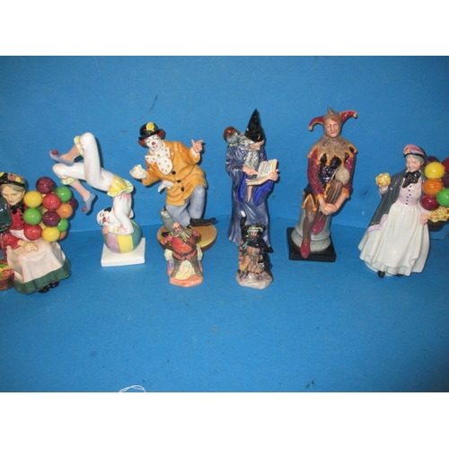 276 - A parcel of vintage Royal Doulton figures, to include a Jester HN2016 A wizard HN 2877 and a Clown H... 