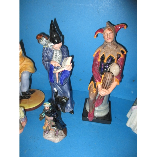 276 - A parcel of vintage Royal Doulton figures, to include a Jester HN2016 A wizard HN 2877 and a Clown H... 