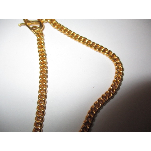 83 - An Indian gold necklace chain and pendant, the pendant having an 1895 American gold 10 dollar coin, ... 