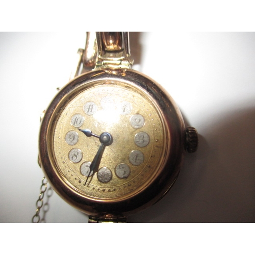 121 - A ladies 9ct gold cased watch, movement marked for Rolex dated c1914, runs when wound, some paperwor... 