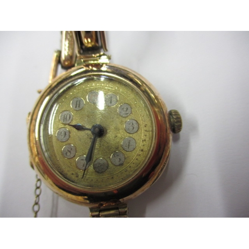 121 - A ladies 9ct gold cased watch, movement marked for Rolex dated c1914, runs when wound, some paperwor... 