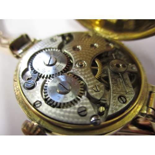 121 - A ladies 9ct gold cased watch, movement marked for Rolex dated c1914, runs when wound, some paperwor... 