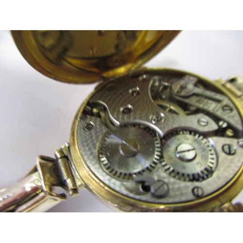 121 - A ladies 9ct gold cased watch, movement marked for Rolex dated c1914, runs when wound, some paperwor... 