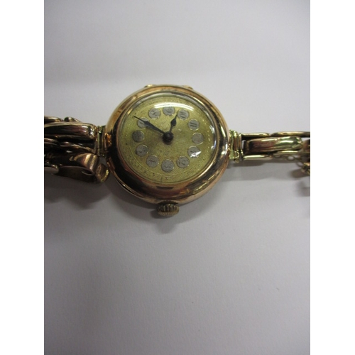 121 - A ladies 9ct gold cased watch, movement marked for Rolex dated c1914, runs when wound, some paperwor... 