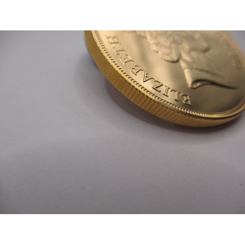 178 - A 1986 gold £5 coin, in brilliantly uncirculated condition, housed in plastic capsule, approx. weigh... 