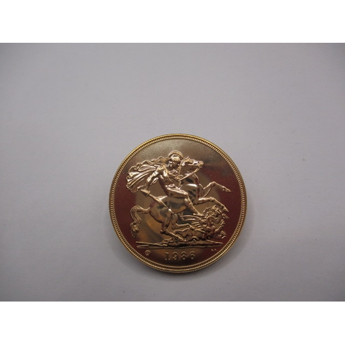 178 - A 1986 gold £5 coin, in brilliantly uncirculated condition, housed in plastic capsule, approx. weigh... 