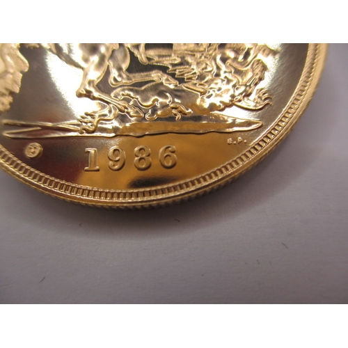 178 - A 1986 gold £5 coin, in brilliantly uncirculated condition, housed in plastic capsule, approx. weigh... 