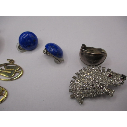 163 - A parcel of costume jewellery to include silver seabourn club cuff studs by Tiffany and a Lalique cr... 