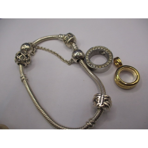 164 - A genuine Pandora bracelet and a Christian Dior necklace, both in good pre-owned condition