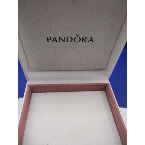 164 - A genuine Pandora bracelet and a Christian Dior necklace, both in good pre-owned condition