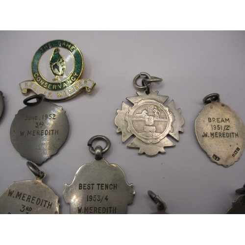 152 - A parcel of vintage fishing medals most 1950s to W Meredith and most silver, all in used condition