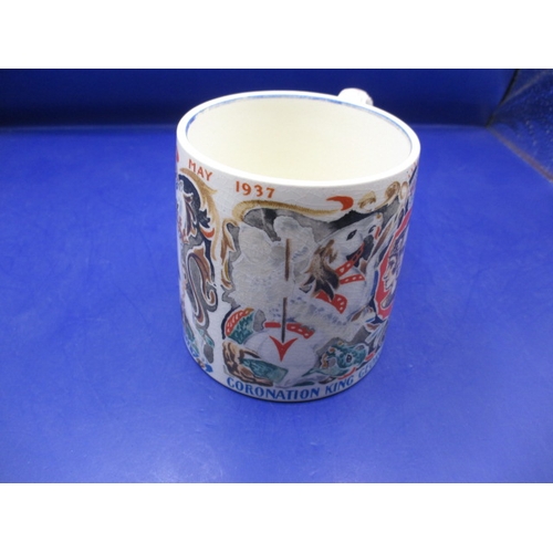 258 - A 1937 Laura Knight coronation mug  for George VI, in good pre-owned condition