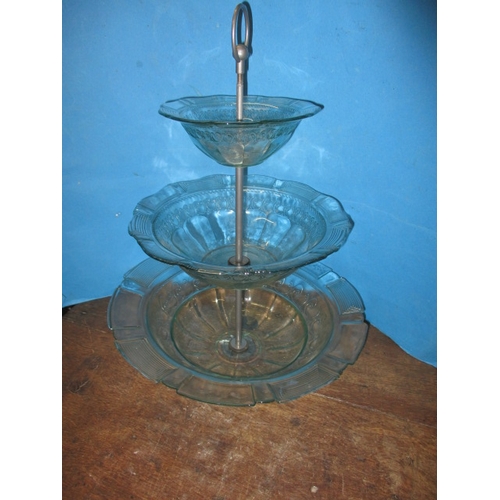 A vintage 3 tier waterfall glass table centre, approx. height 50cm approx. width at base 40cm, in useable pre-owned condition, some minor damage to hole in base bowl