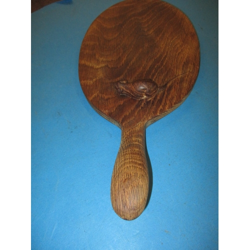 259 - A vintage Robert Thompson (Mouseman) cheese board, having a well carved mouse, general use related m... 