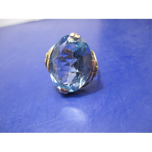 21 - A yellow gold dress ring, set with large solitaire aquamarine. Approx ring size Q, approx. dimension... 