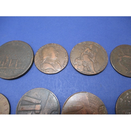 235 - A parcel of 18th and 19th century trade tokens, most associated with Iron works or metal mining, all... 