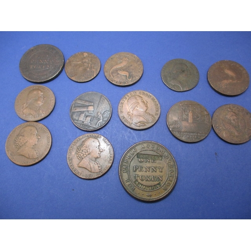 235 - A parcel of 18th and 19th century trade tokens, most associated with Iron works or metal mining, all... 