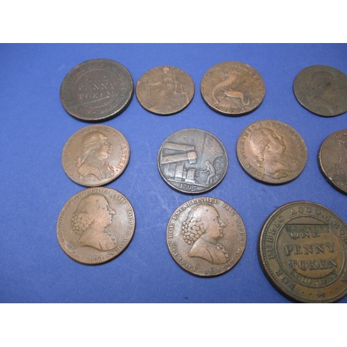 235 - A parcel of 18th and 19th century trade tokens, most associated with Iron works or metal mining, all... 