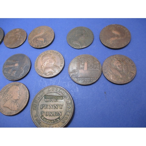 235 - A parcel of 18th and 19th century trade tokens, most associated with Iron works or metal mining, all... 