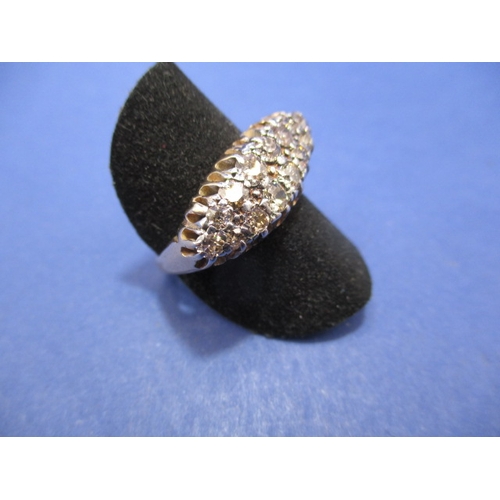 22 - A yellow gold boat shaped diamond cluster ring. Approx. ring size P, approx. weight 4.6g. Worn mark,... 