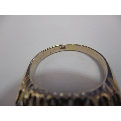 22 - A yellow gold boat shaped diamond cluster ring. Approx. ring size P, approx. weight 4.6g. Worn mark,... 