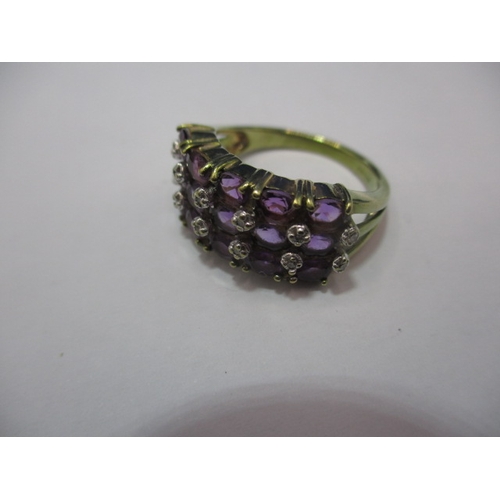 25 - A 9ct gold dress ring set with diamonds and amethyst. Approx. ring size N, approx. weight 4.2g