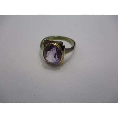 27 - A 9ct gold art deco style ring set with oval amethyst. Approx. ring size N, approx. weight 3.2g