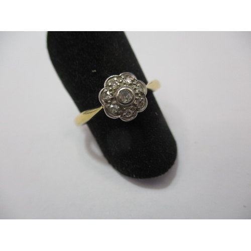 29 - A vintage 18ct yellow gold daisy diamond ring. Approx. ring size L+, approx. weight 2.1g