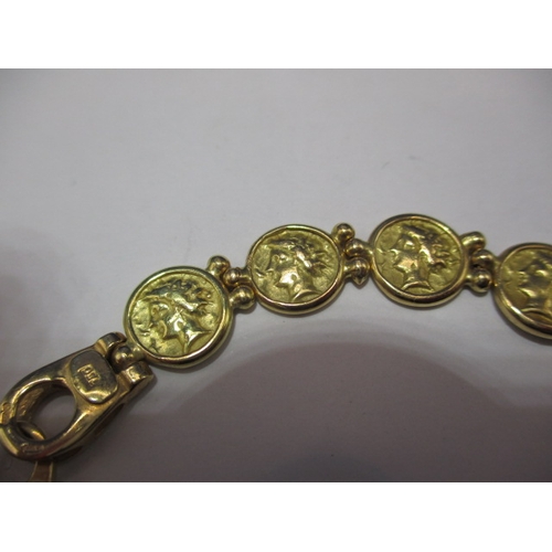 95 - A 750 yellow gold bracelet, having a broken link joint, approx. weight 22.5g