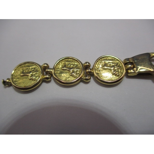 95 - A 750 yellow gold bracelet, having a broken link joint, approx. weight 22.5g