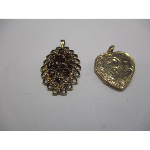 100 - Two necklace pendants, one 9ct gold the other yellow metal set with garnets, both in useable pre-own... 