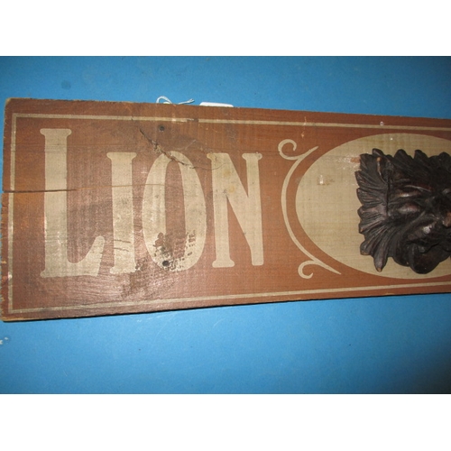 300 - A vintage painted wood advertising sign for Lion Black Lead, approx. size 101x20cm, in useable pre-o... 