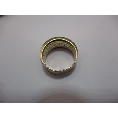 55 - A 9ct yellow gold and diamond wedding band, approx. ring size ‘N’, approx. width 10mm, approx. weigh... 