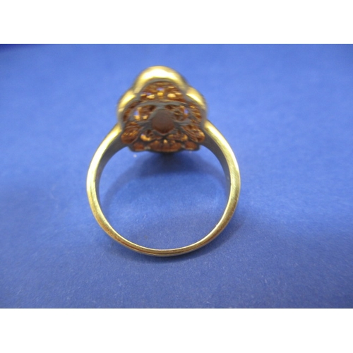 33 - An Asian yellow metal ring with stylized cat motif, approx. ring size ‘N’, approx. weight 3.2g in us... 