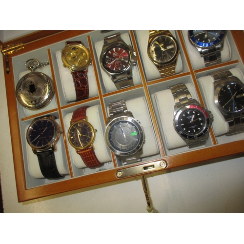 133 - 10 fashion watches in lockable display case, all pre-owned and none tested as to function