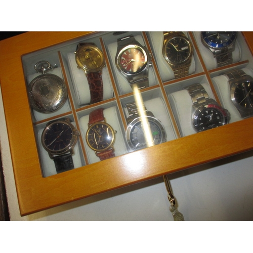 133 - 10 fashion watches in lockable display case, all pre-owned and none tested as to function