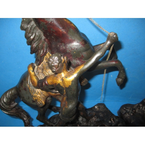 279 - A pair of cast metal Marley horses and a pair of cherubs, in useable pre-owned condition with age-re... 