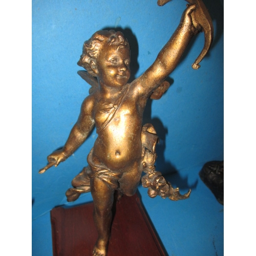 279 - A pair of cast metal Marley horses and a pair of cherubs, in useable pre-owned condition with age-re... 