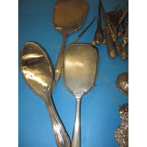 148 - A quantity of silver and white metal items, to include button hooks and dressing table items. All in... 