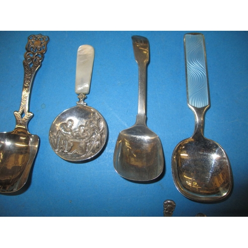 153 - A quantity of Georgian and later silver and white metal caddy and other spoons. To include a Norwegi... 