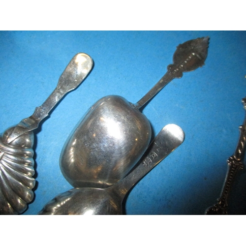 153 - A quantity of Georgian and later silver and white metal caddy and other spoons. To include a Norwegi... 