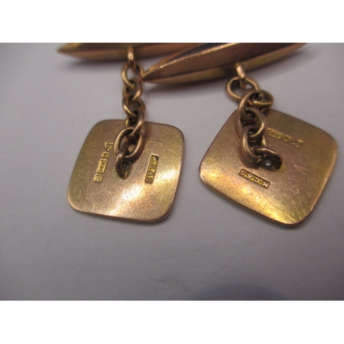 111 - A pair of vintage 9ct gold cufflinks, each with a central diamond, approx. gross parcel weight 5.9g ... 