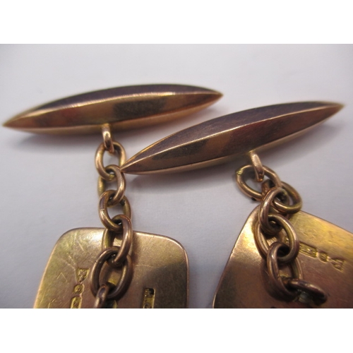 111 - A pair of vintage 9ct gold cufflinks, each with a central diamond, approx. gross parcel weight 5.9g ... 