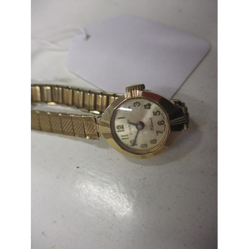 124 - A 9ct gold watch and strap and other costume jewellery items, all in used condition