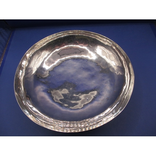 150 - A Sterling Silver bowl with hammer finish, makers mark G.U, date letter Birmingham 1915/16, approx. ... 